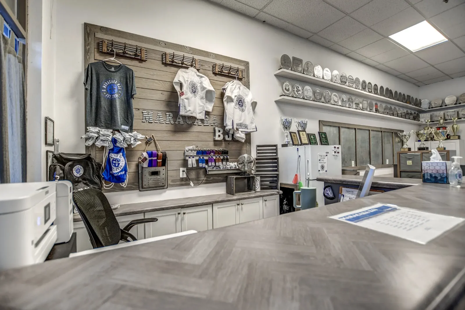 The Maracaba BJJ reception, merchandise, and trophy area