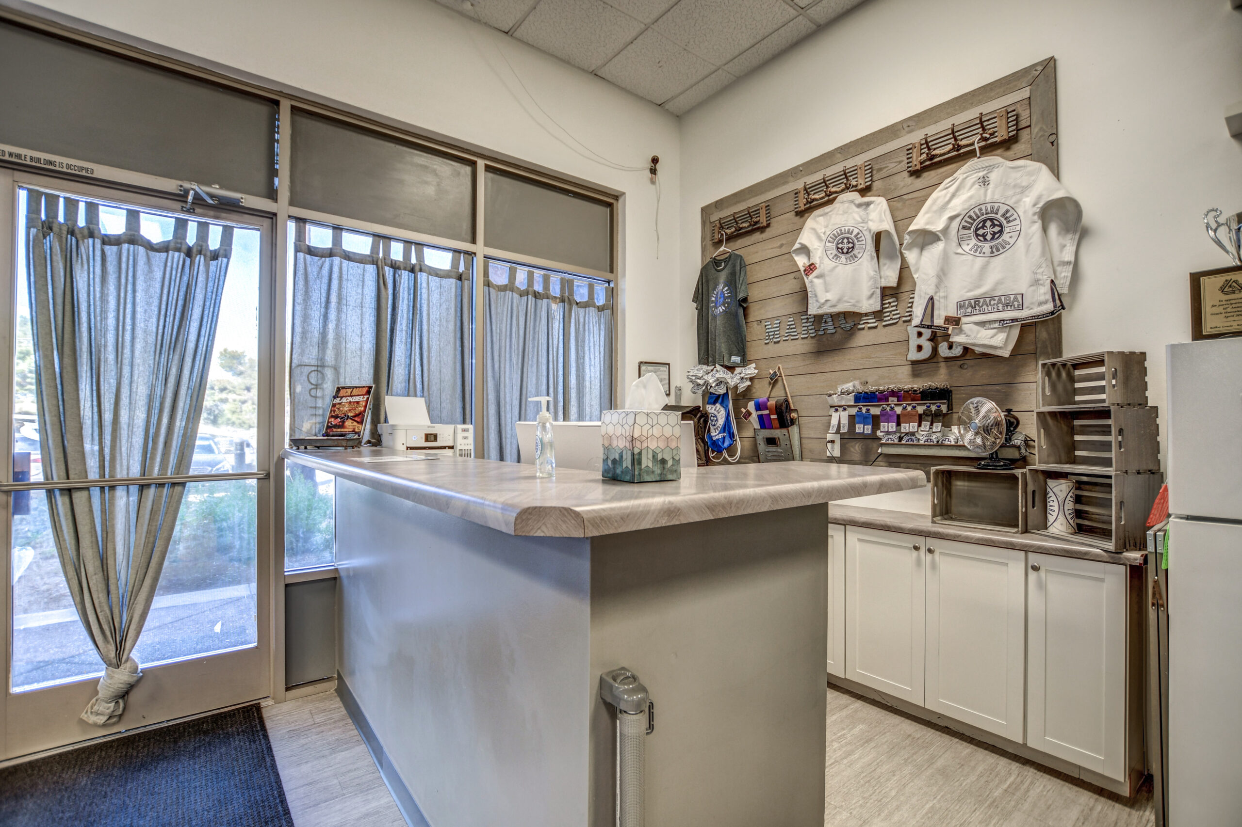 Maracaba BJJ reception counter and academy gear display